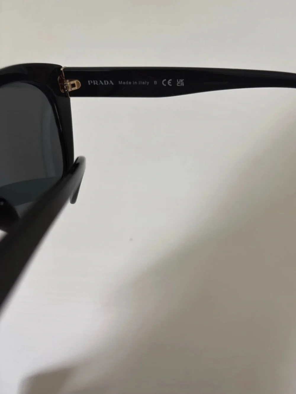 Prada Black Cat-Eye Sunglasses with Navy Pouch